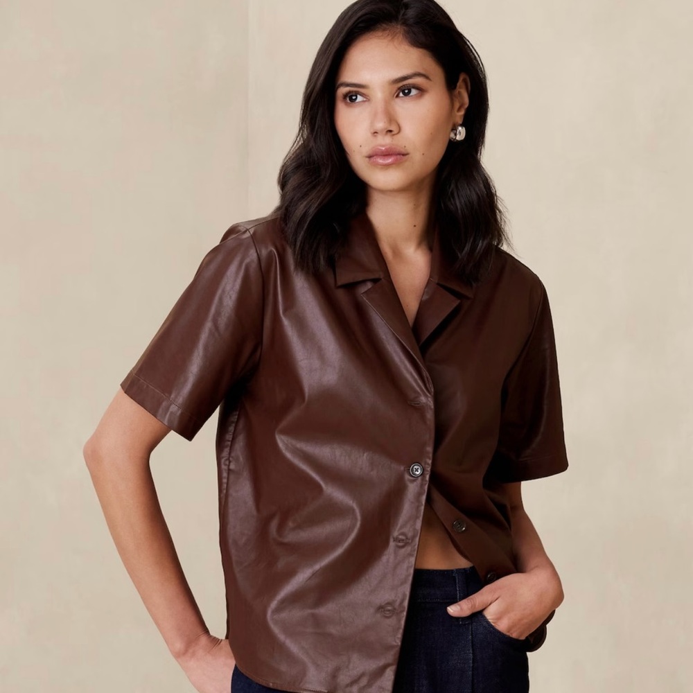 Subtle & oh so chic. Vegan leather button up short sleeve shirt.